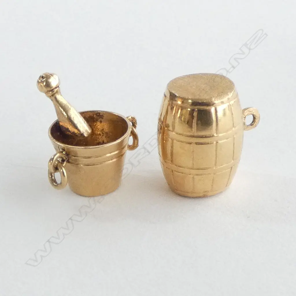 2 18CT CHARMS; BARREL, CHAMPAGNE COLLER AND BOTTLE TOP[ 3.2grms Image 1++