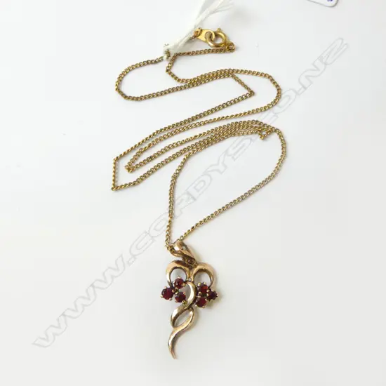 9ct GARNET & DIAMOND? PENDANT on a chain, 1.8gm