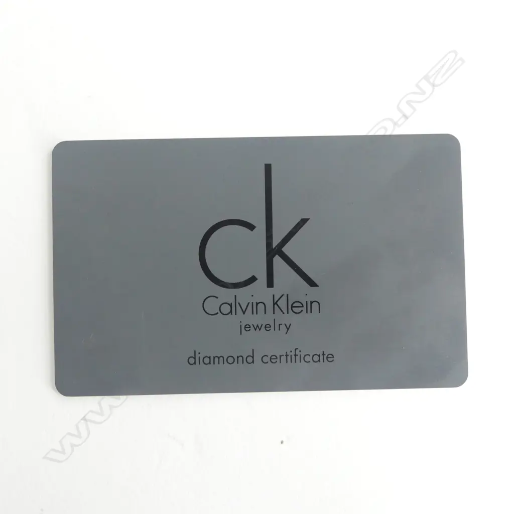 **RTV**  CALVIN KLEIN 31 DIAMOND (0.155CT) 'LIQUID' BRACELET. White metal. 58.6grmS L.16.5CM SMALL SIZE Image 1++