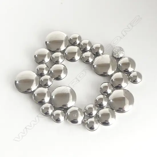 **RTV**  CALVIN KLEIN 31 DIAMOND (0.155CT) 'LIQUID' BRACELET. White metal. 58.6grmS L.16.5CM SMALL SIZE