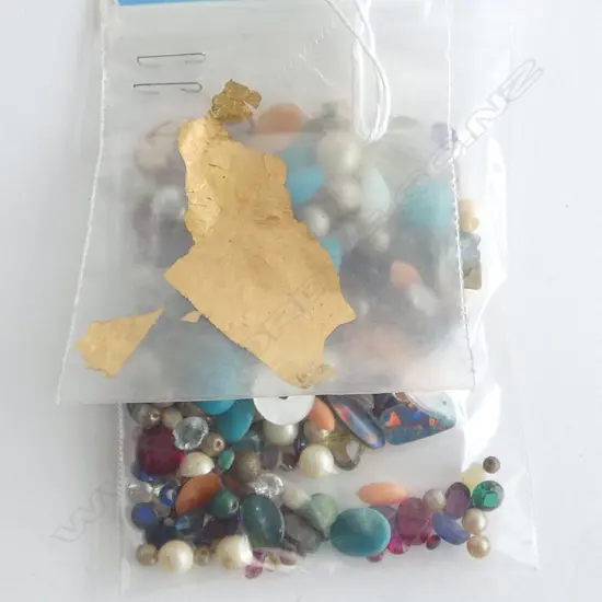 BAG OF LOOSE GEM STONES + GOLD LEAF PIECE