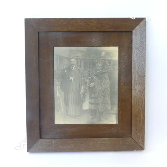 G 2 MEN. 1 JAPANESE 1 MVINTAGE OAK FRAMED B/W PHOTO DEPICTINAORI in traditional dress 'T. W. RATANA WHANGANUI' 290x240mm