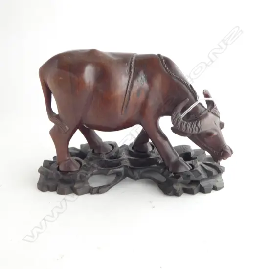 old ORIENTAL CARVED HARDWOOD BUFFALO on carved stand L.205mm