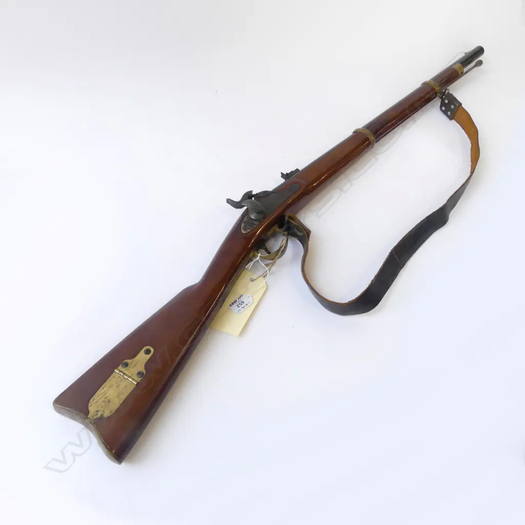 Replica .58 percussion Zoauve carbine by Antonio Zoli. Condition almost as new but action stiff. With leather sling. Very good condition. Fire Arms License Required. Image 1++