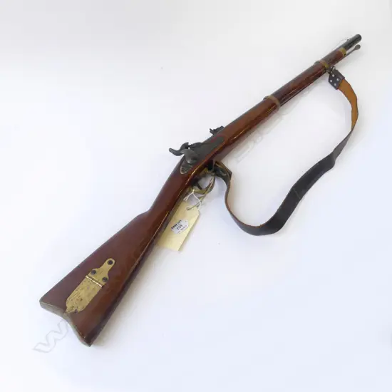 Replica .58 percussion Zoauve carbine by Antonio Zoli. Condition almost as new but action stiff. With leather sling. Very good condition. Fire Arms License Required.