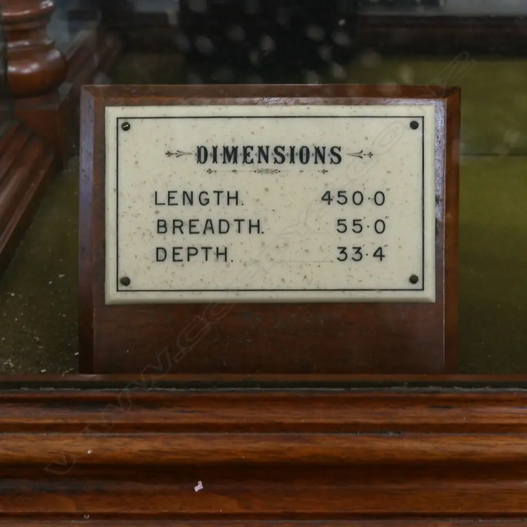 An exceptional quality professionally built ship builders model of the 'Twin Screw Steamer 'NIWARU'' -  by Workman, Clark & Co. Ltd. Belfast. The fine detail including brass fittings, rigging, life boats etc. In glazed walnut case with turned detail and mirrored back. Image 1++