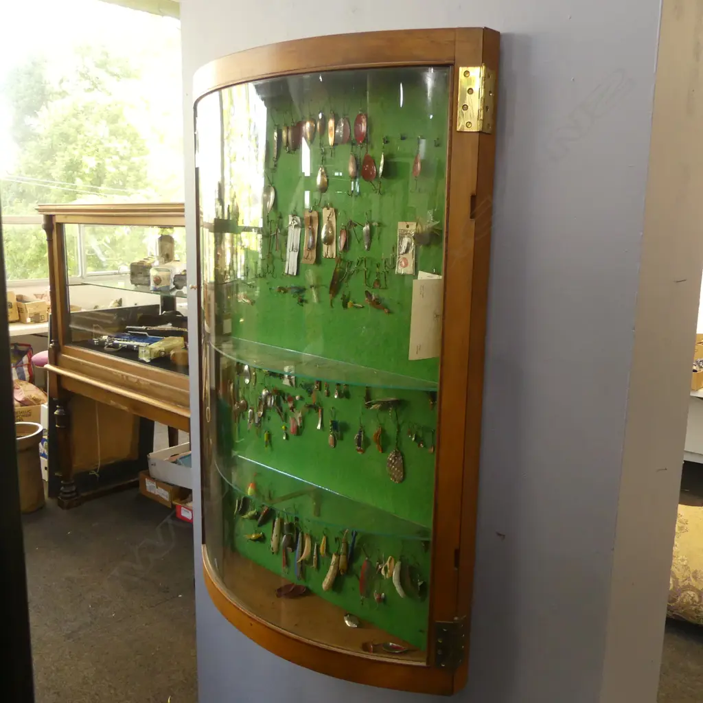 VICT CONVEX GLASS WALL DISPLAY CABINET H1200 L800MM CONTAINING VINTAGE COLLECTION OF FRESH WATER FISHING LURES APROX 140 Image 1++