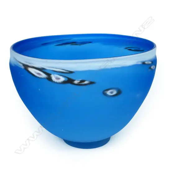 Lynette Campbell (-2005) large blue footed glass bowl. Matte blue finish with millefiori detail and white band around the rim. Signed and dated '96 to base. H.180mm Dia.240mm