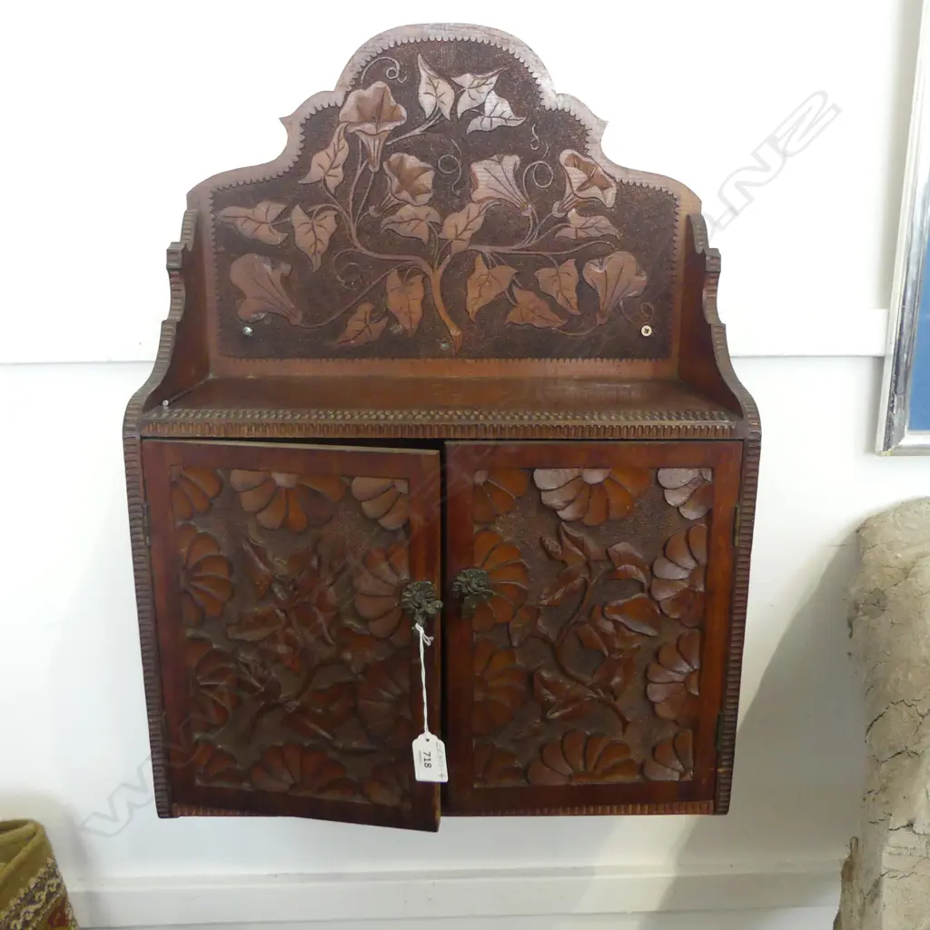 ARTS & CRAFTS CARVED WALL HANGING CABINET, H.750x470mm, note: sign old borer to top shelf Image 1++