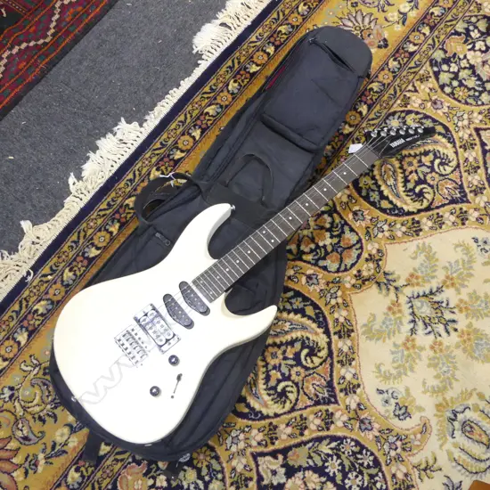 VINTAGE YAMAHA RGX 112J ELECTRIC GUITAR IN CARRY CASE inscribed signature to body on reverse