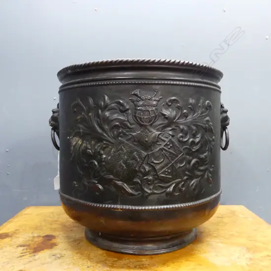 ENGLISH BRONZED FIRESIDE LOG BIN w. lion mask ring handles & embossed armorial crest H.400 Dia.405mm