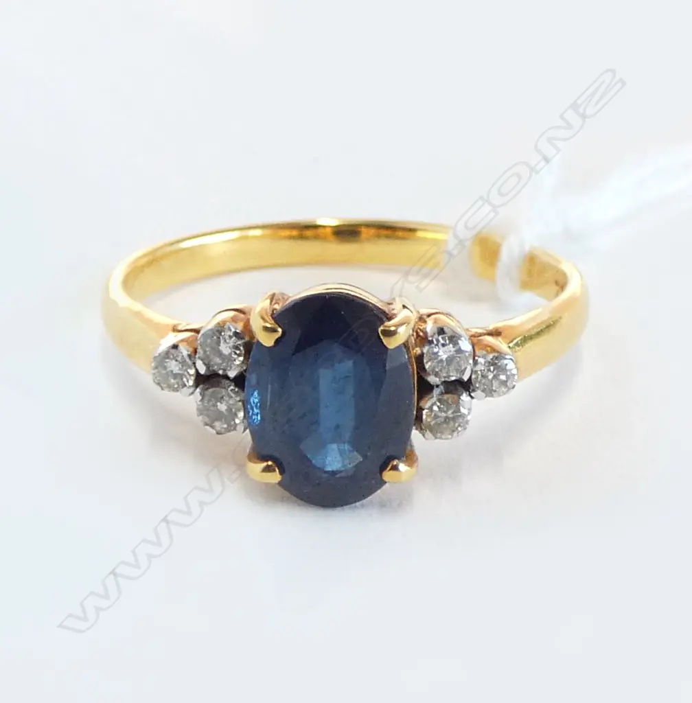 18ct SAPPHIRE & DIAMOND SET, 3.2gm, SIZE O claws worn on outside diamonds Image 1++