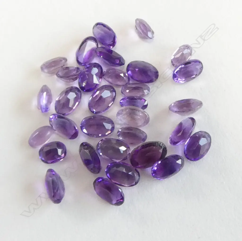 12CT SMALL OVAL FACETED AMETHYST Image 1++