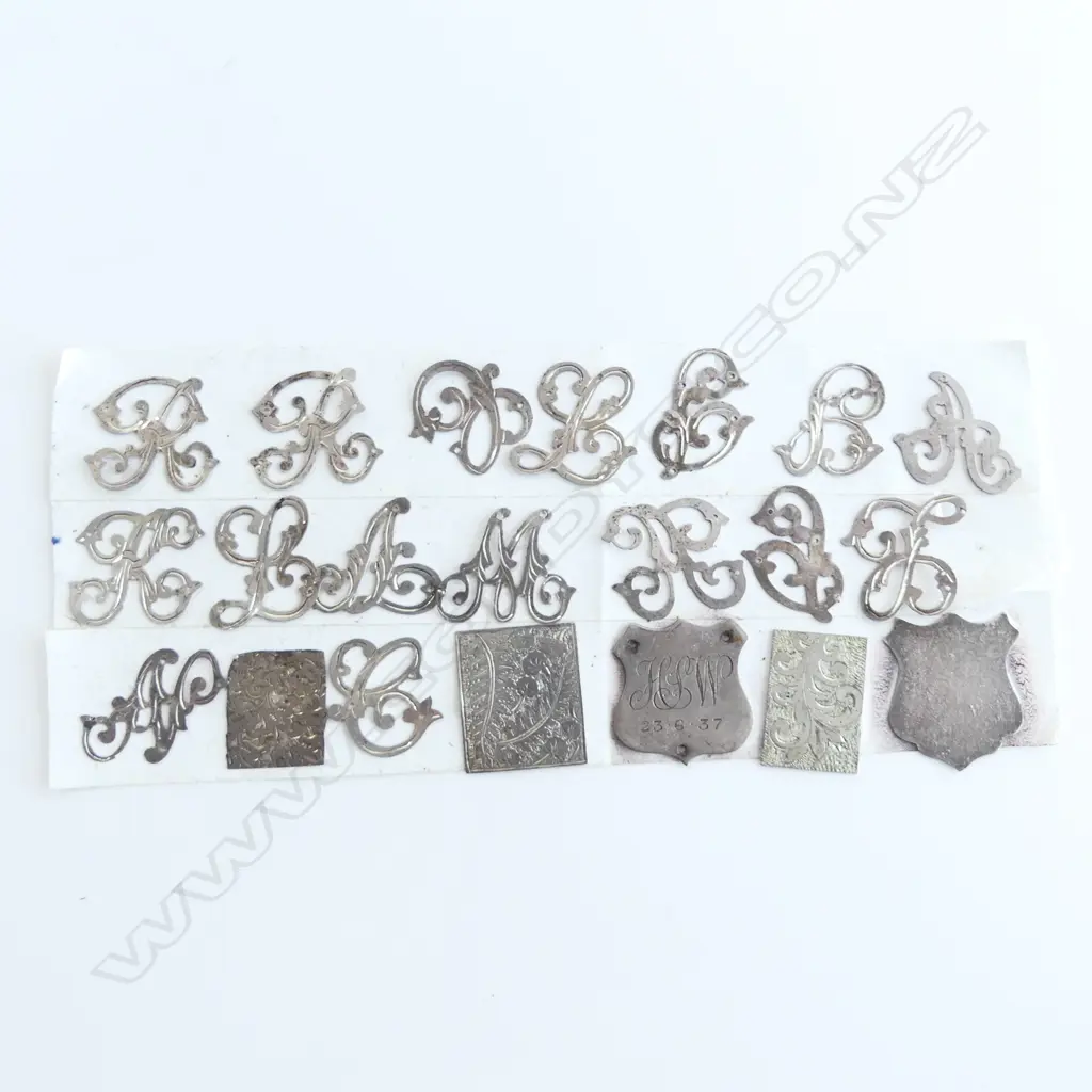 21 ASST. ETCHED SILVER PCES INCLUDING 16 STYLISED LETTERS Image 1++