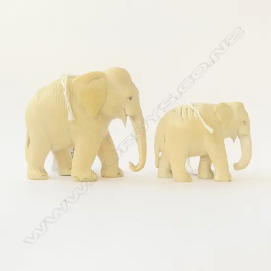 2 CARVED IVORY ELEPHANTS small faults tallest H.90mm