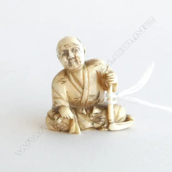 IVORY NETSUKE FARMER, SIGNED