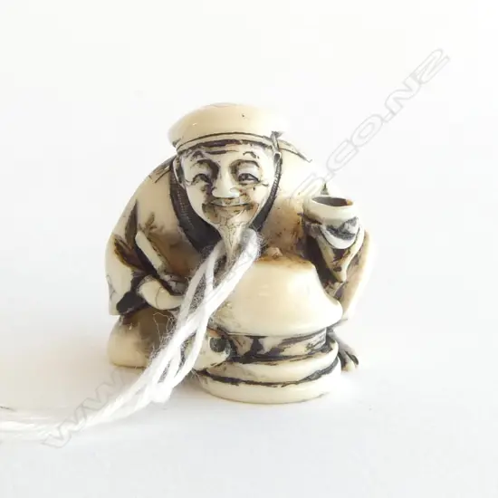 IVORY NETSUKE MAN w. CUP, SIGNED
