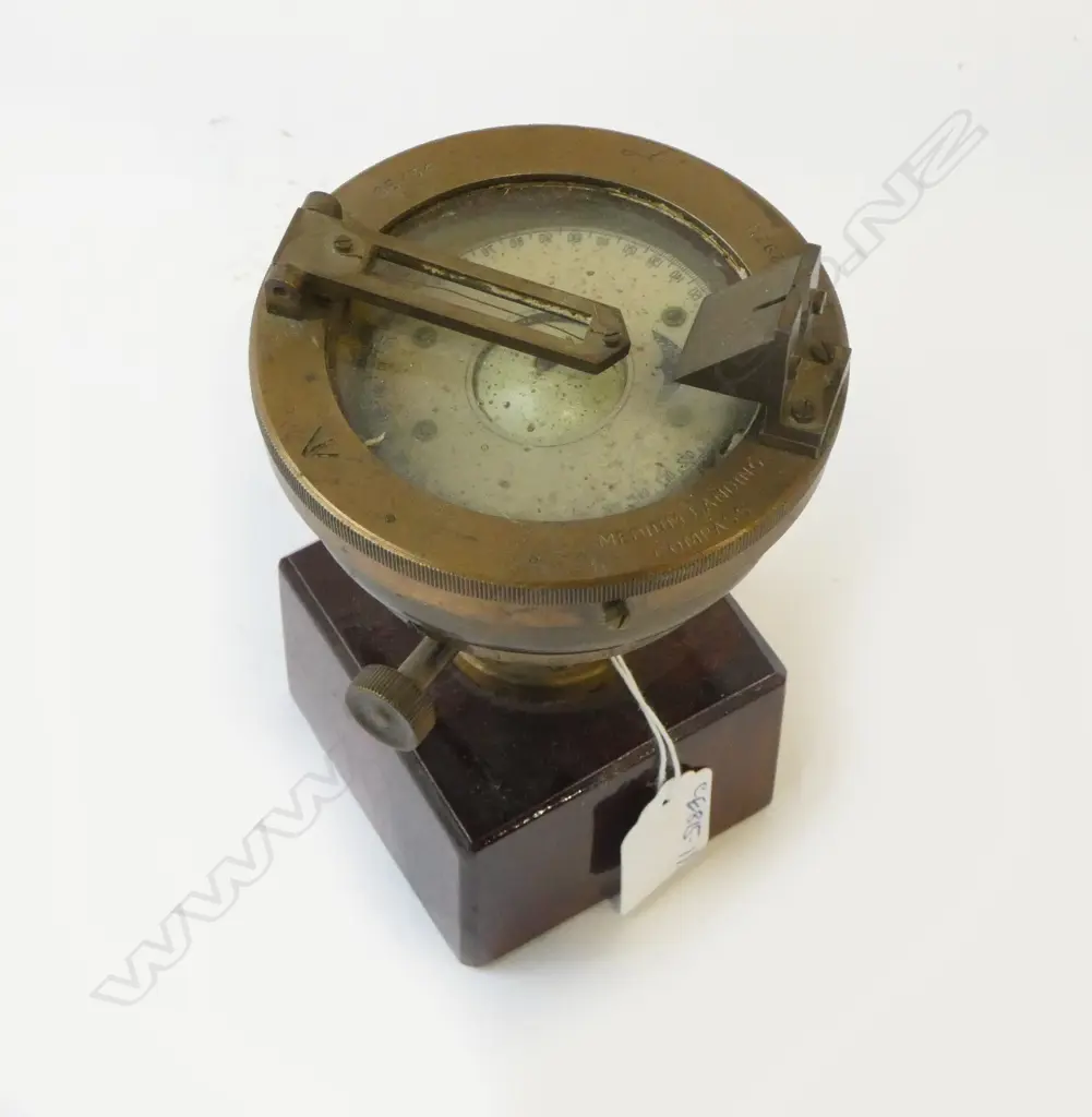 VINTAGE BRASS NAVAL ISSUE 'MEDIUM LANDING COMPASS' with broad arrow mark. Dia.100mm. Raised on mahogany stand H.130mm  Image 1++