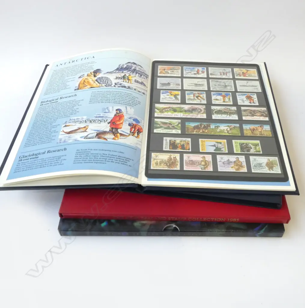 3 CASED 'THE NZ STAMP COLLECTION' ALBUMS, YEARS; 1984,'85,'97 Image 1++