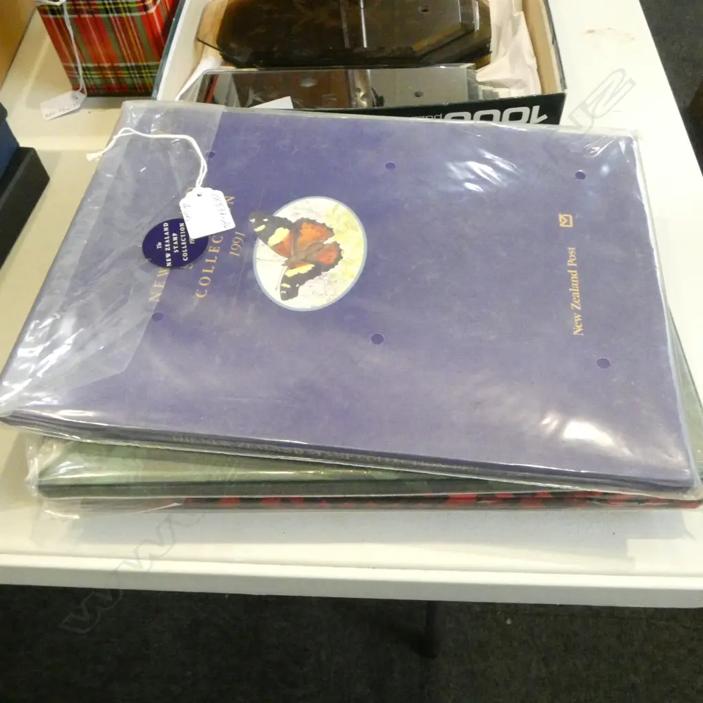 4 UNWRAPPED CASED 'THE NZ STAMP COLLECTION' ALBUM, YEARS; 1991, 92, 93 & 94 Image 1++