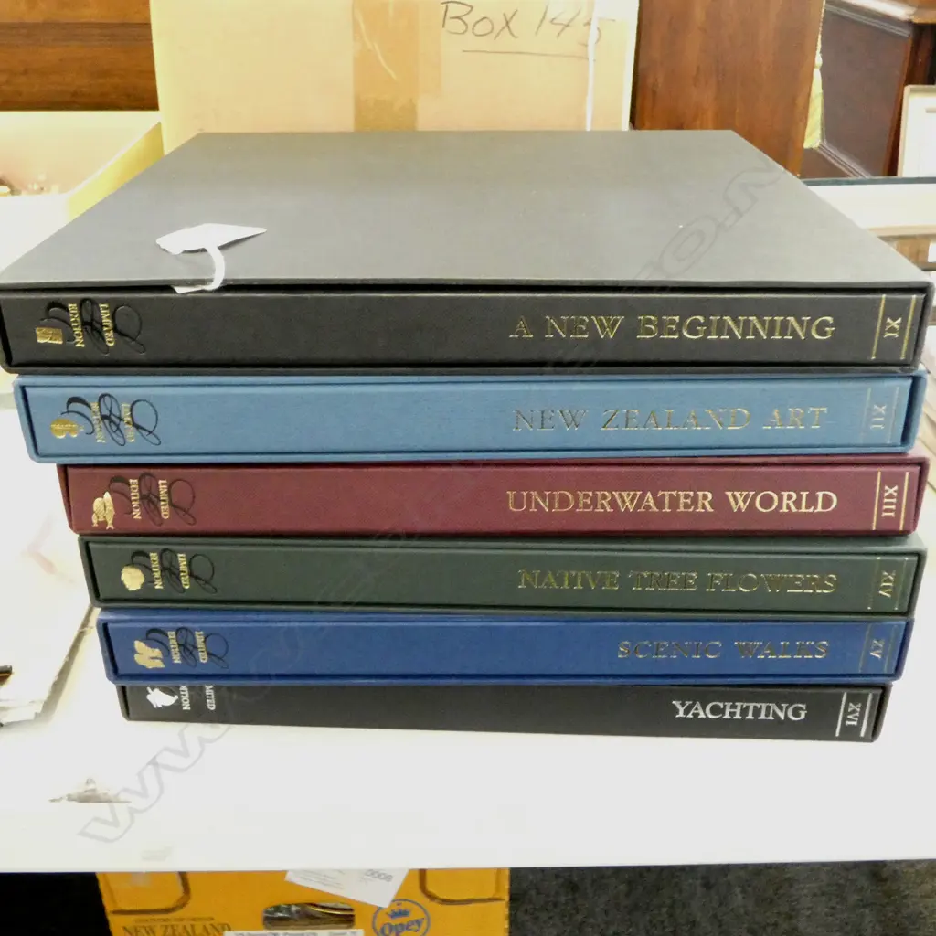 VOLS 11-16 CASED LTD ED NZ POST THEMED STAMP ALBUMS; YACHTING, NZ ART, UNDERWATER WORLD, NATIVE FLORA, SCENIC WALKS  ETC Image 1++