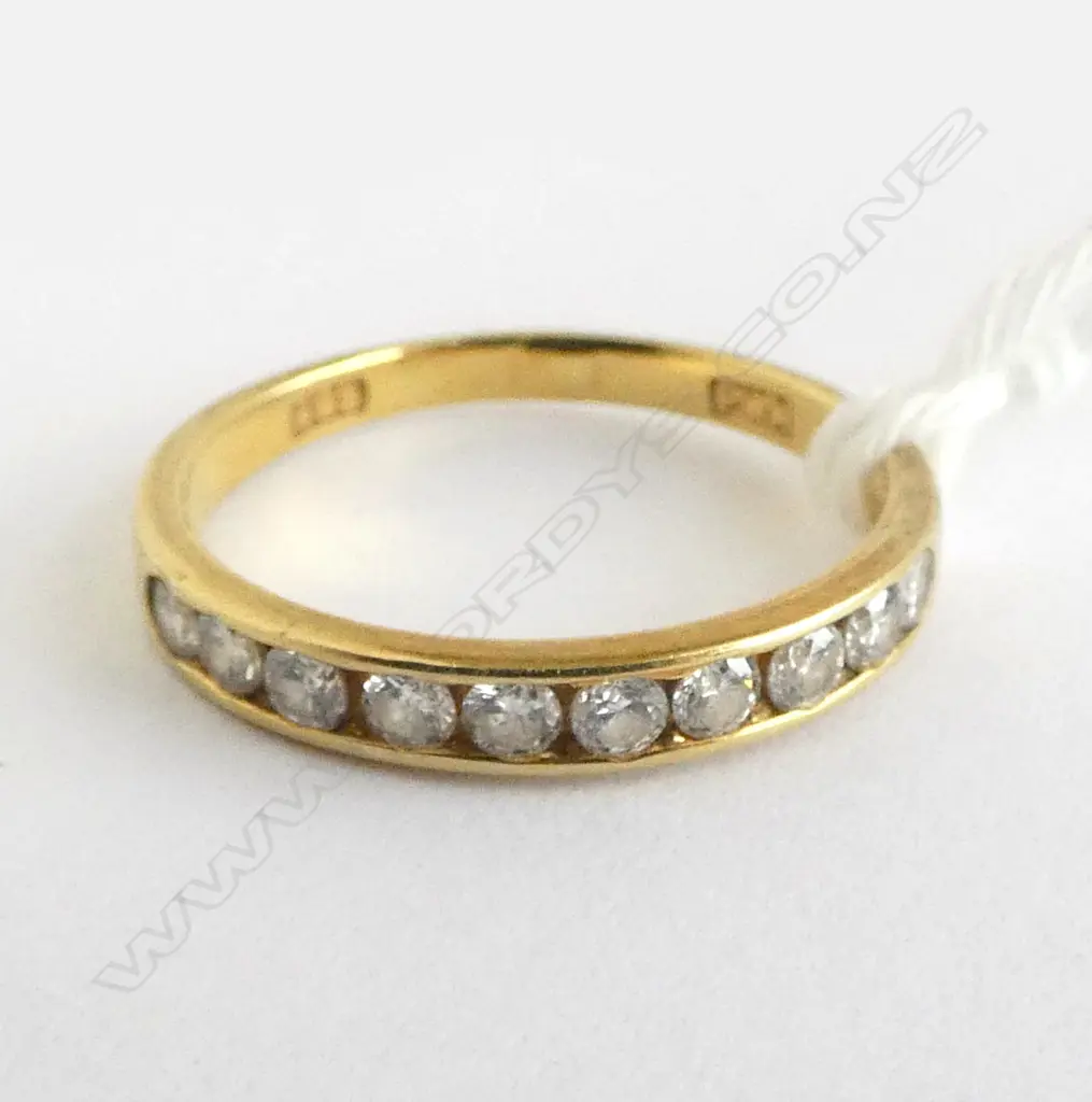 14ct GOLD BAND RING channel set with 10 BRILLIANT CUT DIAMONDS 2gms SIZE N Image 1++