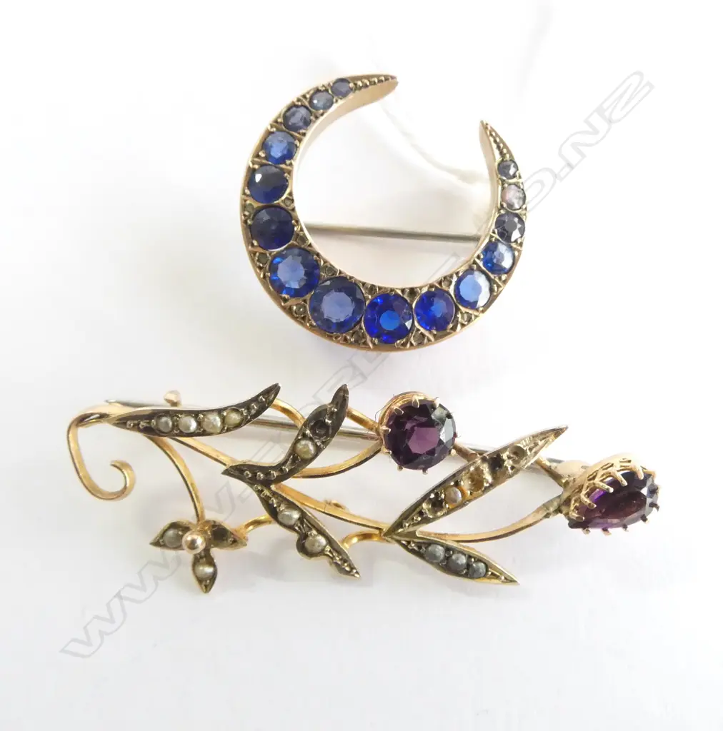 2 9ct BROOCHES; CRESCENT w BLUE STONES & PURPLE STONE & SEED PEARL (some seed pearls missing) Image 1++