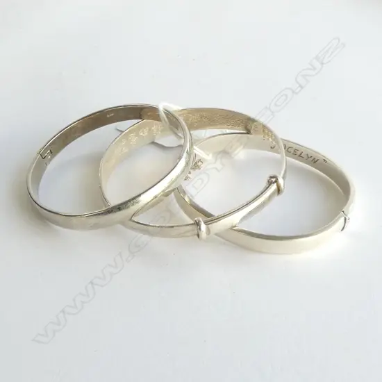 THREE STG SILVER BRACELETS TW 63.2gm