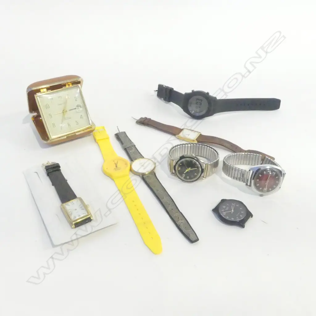COLLECTION OF 7 WRISTWATCHES & TRAVLING ALARM CLOCK Image 1++