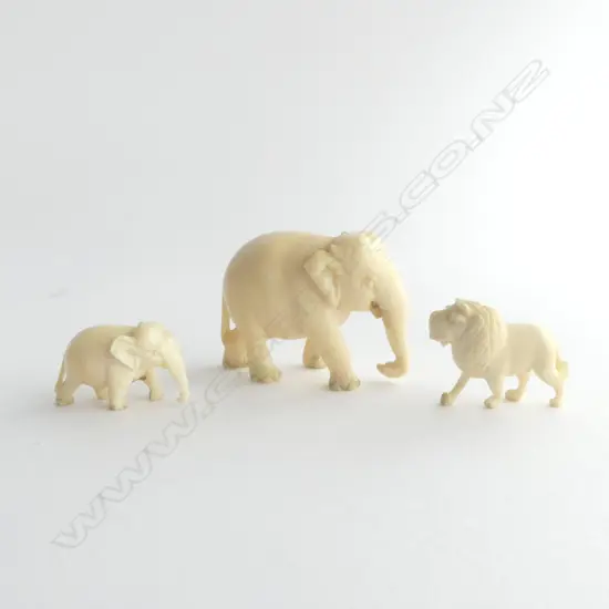 MINIATURE IVORY ELEPHANTS & LION 