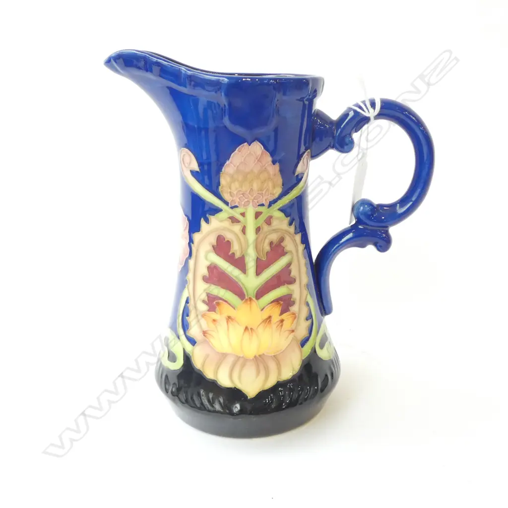 Old Tupton ware like tube lined blue jug with Sevres style factory mark. H.185mm  Image 1++