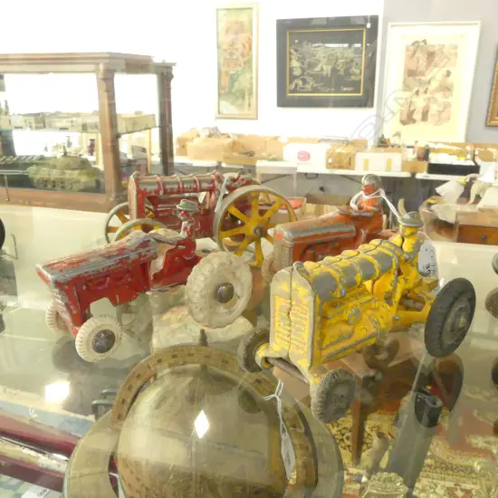 FOUR FUNHO TRACTORS 2 RED (ONE HEADLESS DRIVER), 1 YELLOW &  1 ORANGE 