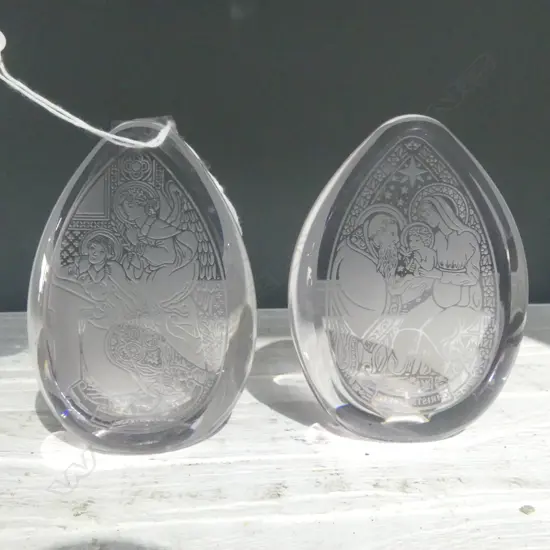 TWO GLASS TEARDROP PAPERWEIGHTS  ACID ETCHED WITH XMAS SCENES, ONE 1976 OTHER 1977 H. 110mm