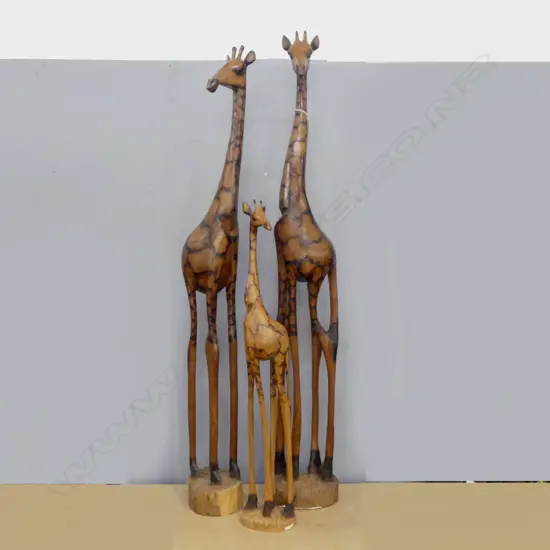 3 GRADUATED CARVED WOOD GIRAFFE SCULPTURES H.920mm