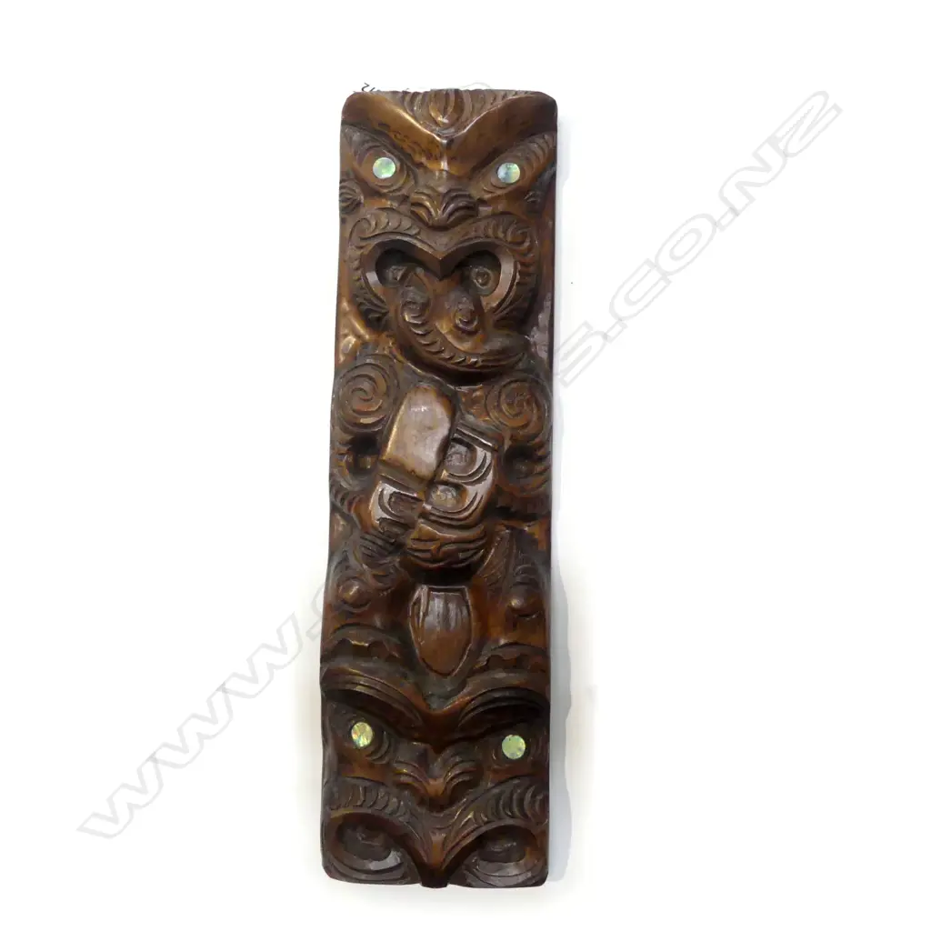 MODERN CARVED MAORI 'POUPOU' PANEL H.435mm with inlaid paua eyes Image 1++