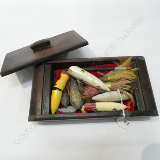 WOODEN BOX OF OLD PAINTED WOODEN FISHING LURES with feathers & lead sinkers etc