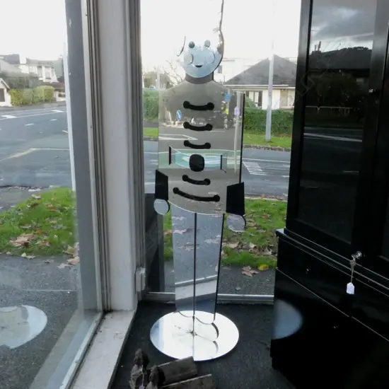 LARGE COLOURED PERSPEX MIRROR PANELLED NUT CRACKER on circular stand H.2000mm