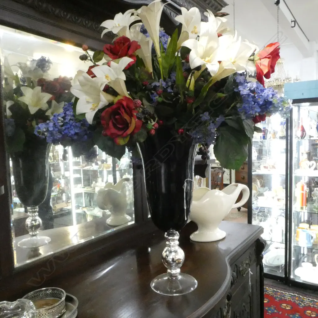 VERY TALL DEEP RED GLASS VASE WITH FAUX FLORAL DISPLAY. Vase height 500mm. silver & clear base Image 1++