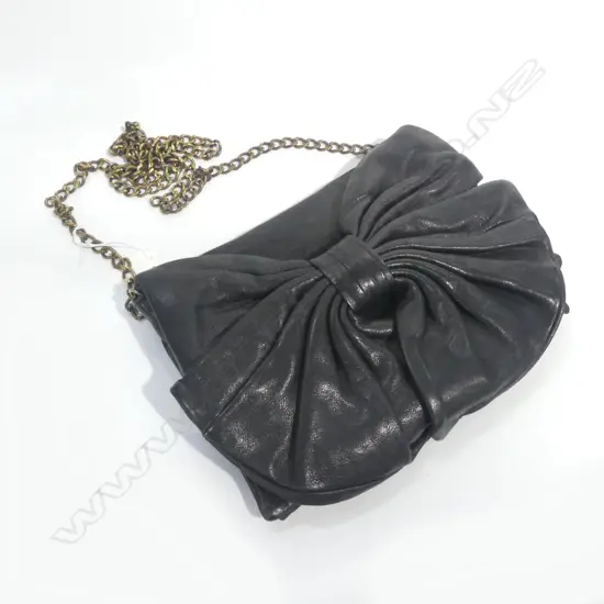 VINTAGE 'RED VALENTINO' BLACK LEATHER HANDBAG showing wear. repair to leather near clasp