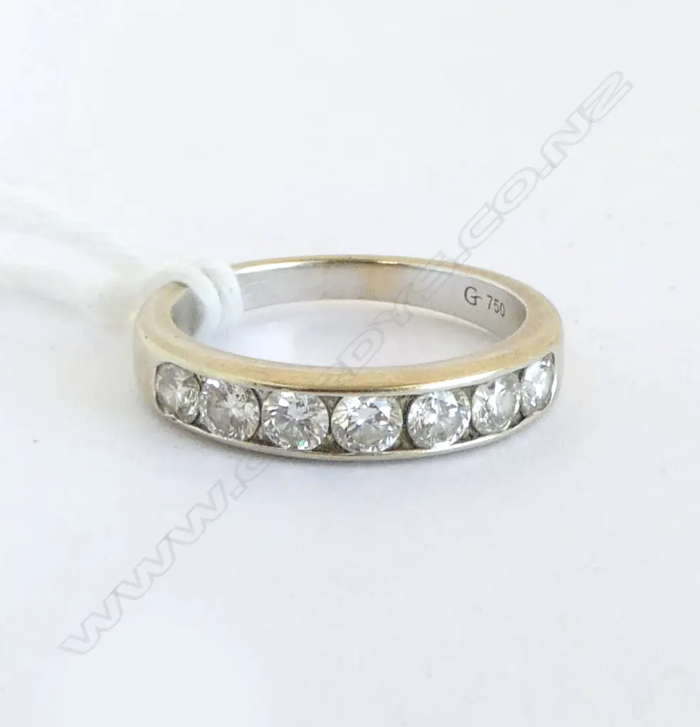 18CT WHITE GOLD AND DIAMOND SET BAND - TDW. 0.90ct ROUND BRILLIANT CUT COLOUR G-H CLARITY SI1-I1 SIZE K 1/2 Image 1++