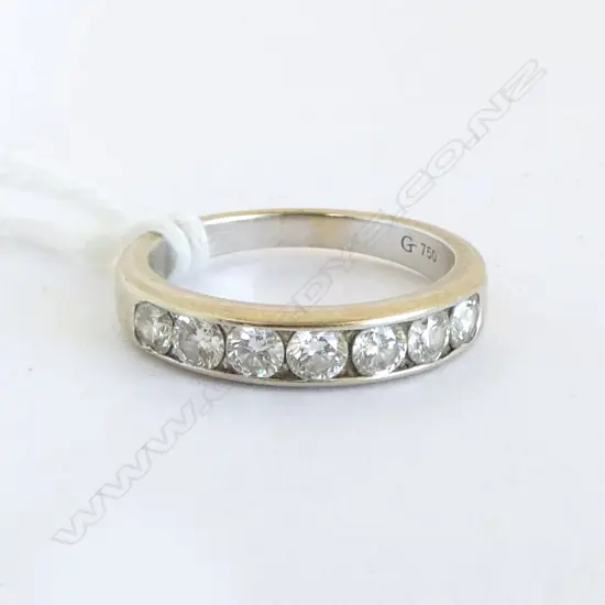 18CT WHITE GOLD AND DIAMOND SET BAND - TDW. 0.90ct ROUND BRILLIANT CUT COLOUR G-H CLARITY SI1-I1 SIZE K 1/2