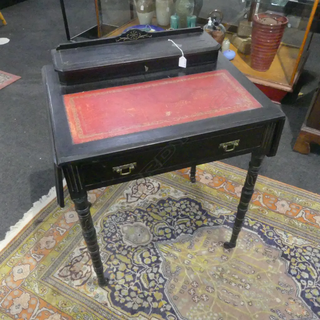 VICTORIAN EBONISED LADIES WRITING DESK with drop side flaps. The hinged lid top compartment fitted. Slender legs. Size.. Image 1++
