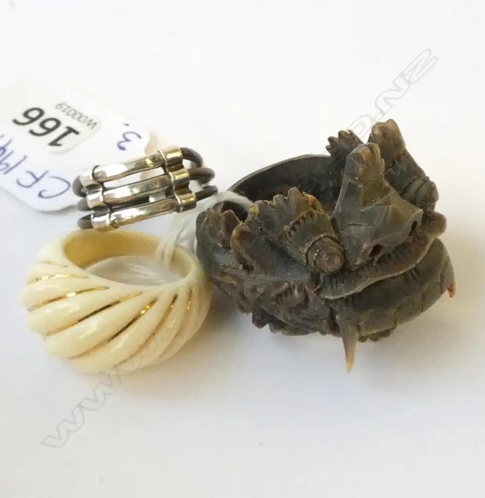3 RINGS; INDONESIAN CARVED MASK, IVORY & 14CT, SILVER & ELEPHANT TAIL HAIR Image 1++