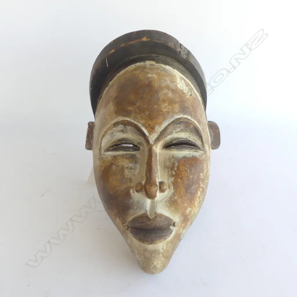 AFRICAN VUVI MASK GABON H.330mm (DAMAGE TO ONE EAR). Provenance: Ex. The estate of John Perry. Image 1++