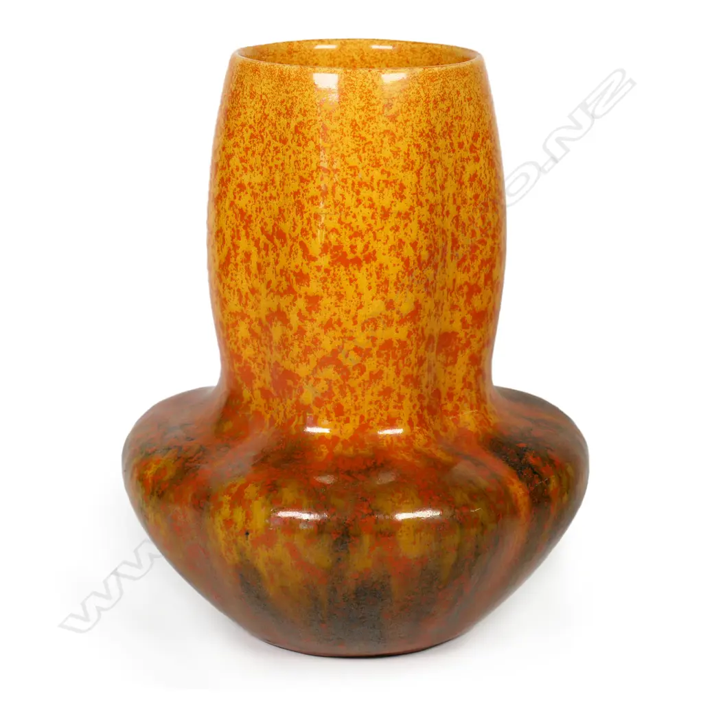 A Pilkington’s Royal Lancastrian vase with squat ovoid lobed base, orange glaze with mottled red and dark highlights, impressed mark. H.165mm. Image 1++