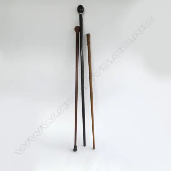 THREE WOODEN WALKING STICKS L.980mm