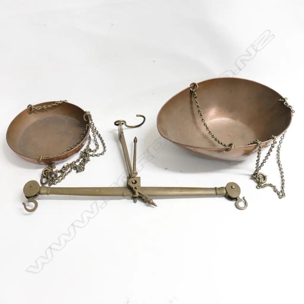 A mid-19th century bronze and copper hanging balance scale by H Pooley & Sons England.  Issued to British forces stationed in Fort of Whanganui 1860's. Image 1++