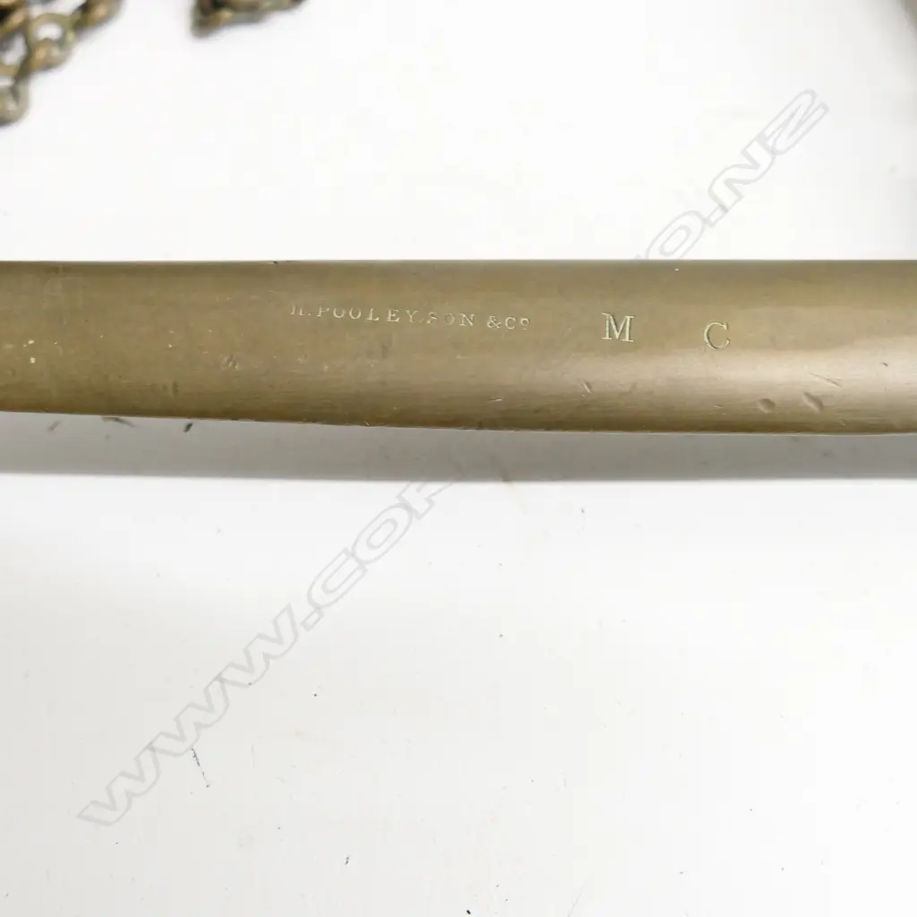 A mid-19th century bronze and copper hanging balance scale by H Pooley & Sons England.  Issued to British forces stationed in Fort of Whanganui 1860's. Image 1++