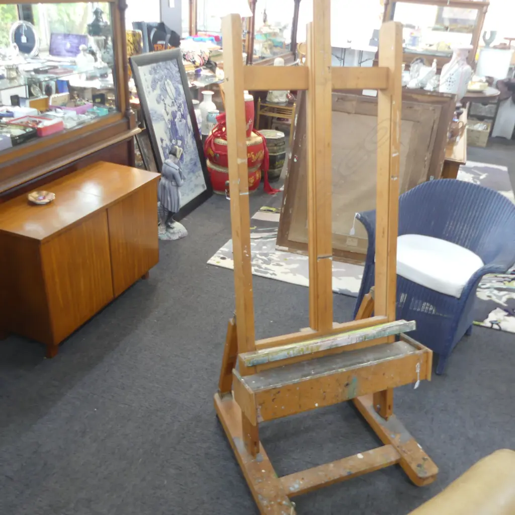 ITALIAN WOODEN EASEL EX-GORDON HARRIS. ADJUSTABLE HEIGHT & CRANK HANDLE. W.700mm H.1630 APPROX D.690mm Image 1++