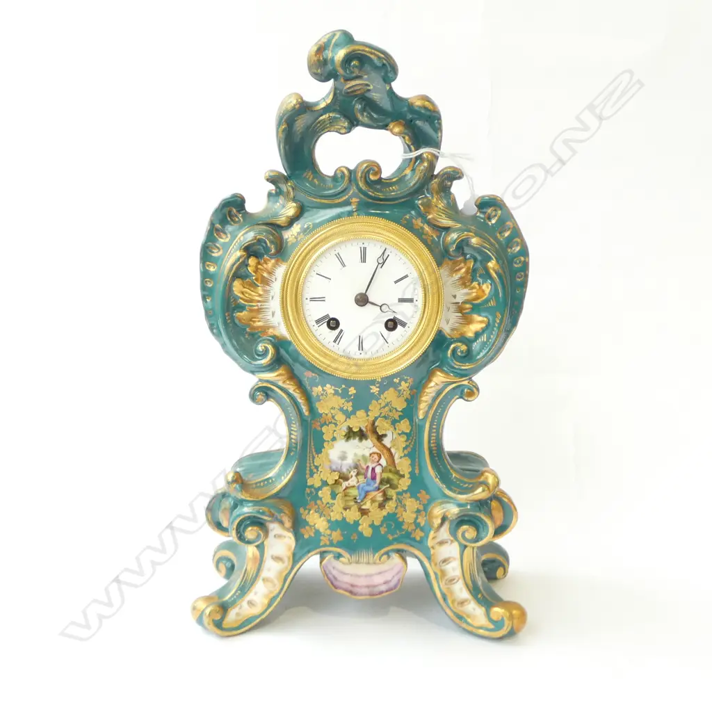 FRENCH PORCELAIN MANTLE CLOCK AND BASE, ESCUTCHEON SHAPED, HANDPAINTED PASTORAL SCENE, REPAIR TO CREST, H.330mm Image 1++